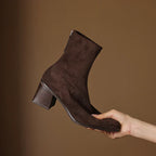 Botas con cremallera lateral y construcción suave y flexible