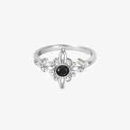 Silver-Tone Ring with Black Stone and Knot Design