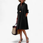 Flowing Dress with a Shimmer Detail at the Neckline