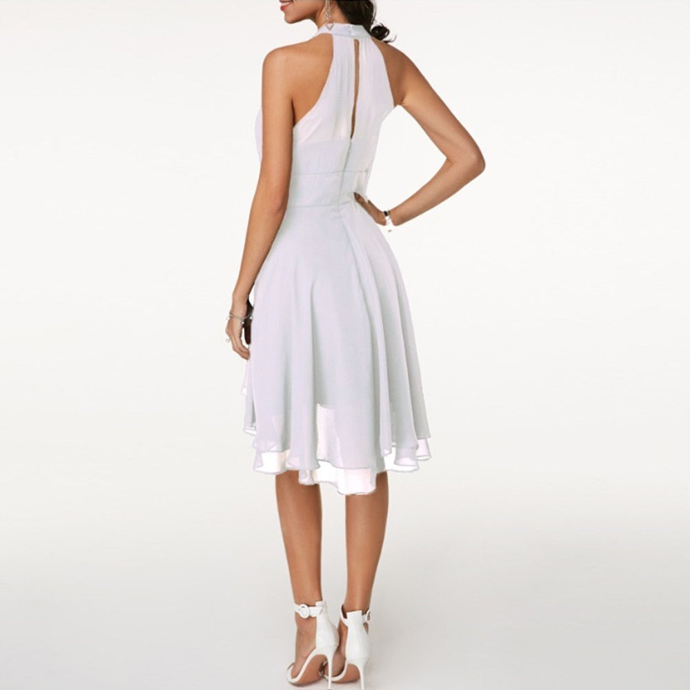 Vestido midi con volantes y silueta fluida y femenina