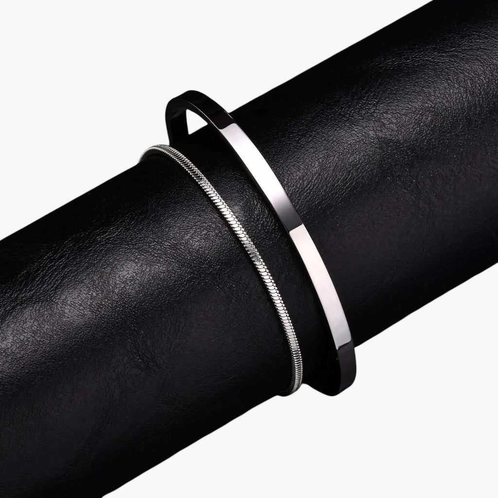 Conjunto de pulseras de acero inoxidable para hombre con detalles en negro