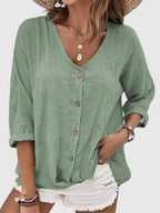 Blusa ligera con cuello de pico y comodidad vaporosa