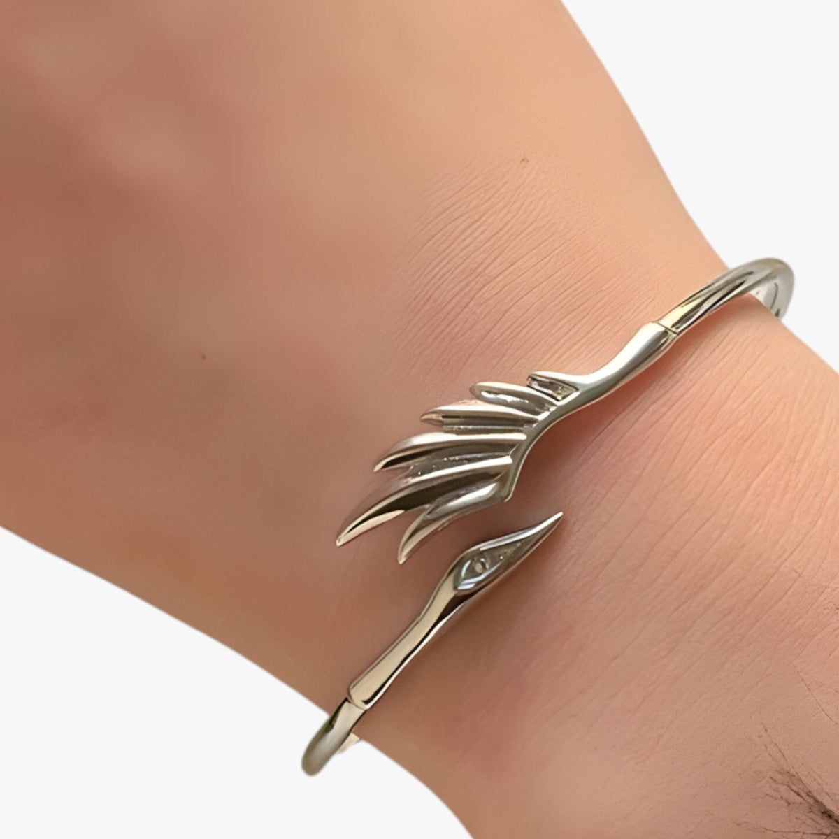 Silver-Tone Bracelet with Gold-Tone Feather Detail