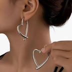 Personalised heart-shaped earrings in silver and gold tones
