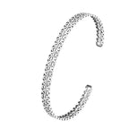 Silverarmband i manschettmodell med fingranna molninspirerade linjer