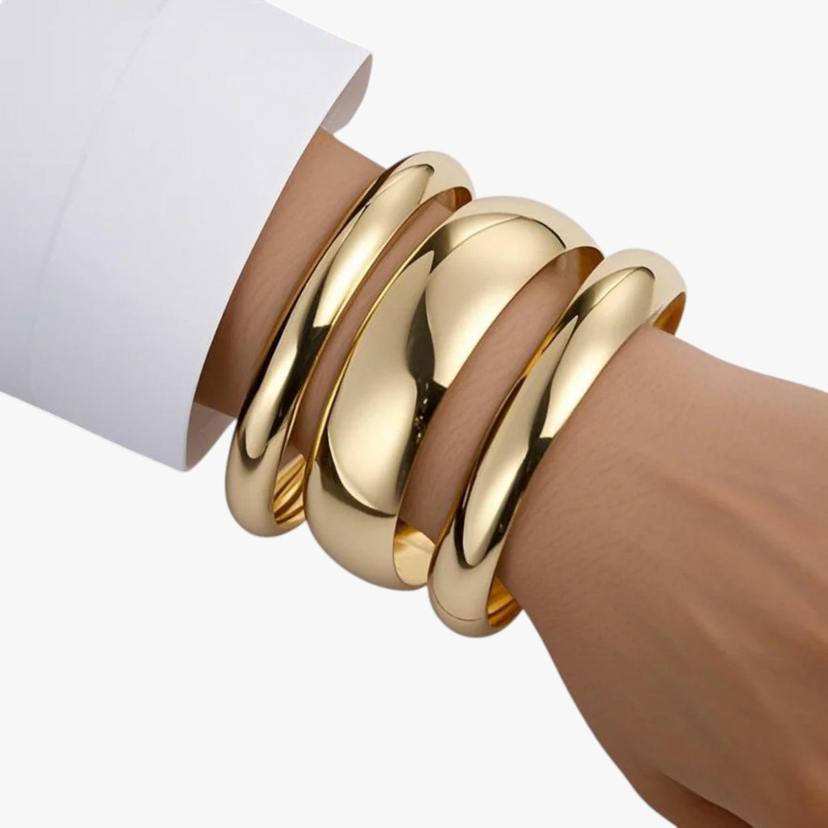 Conjunto de pulseras doradas apilables con carácter para la noche