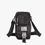Crossbody-väska i vävt material med detaljer i konstläder