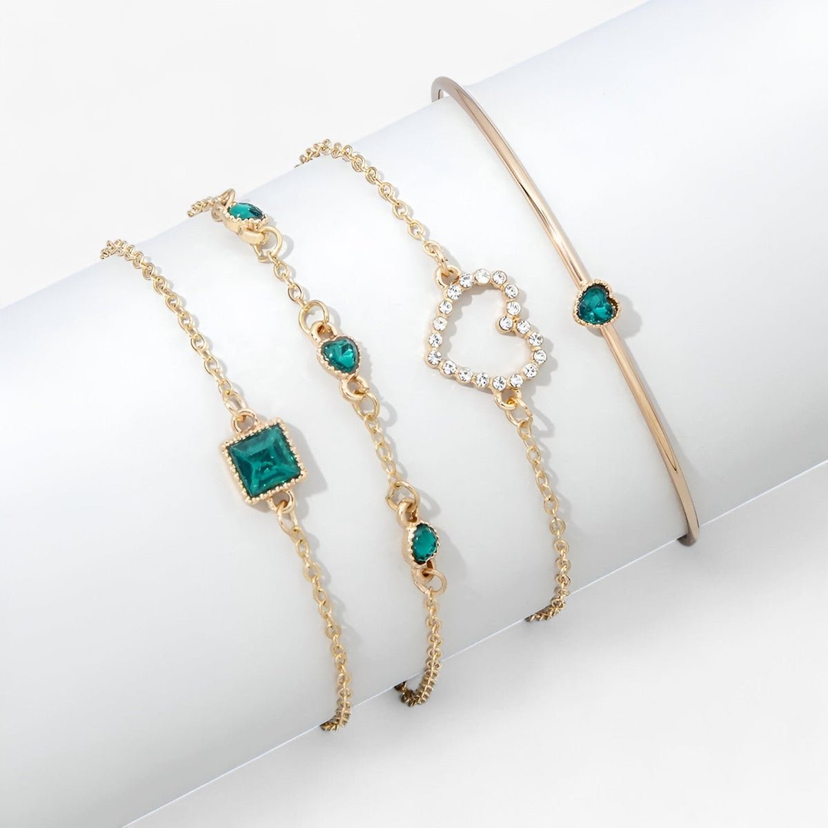 Gold-Tone Bracelet with Emerald and Zirconia Charm