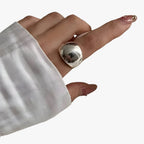 Adjustable Silver-Tone Ring with a Minimalist Design