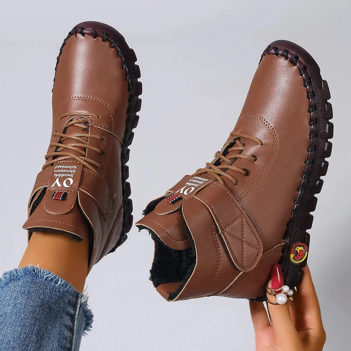 Botas de invierno forradas de borreguito con puntera redonda