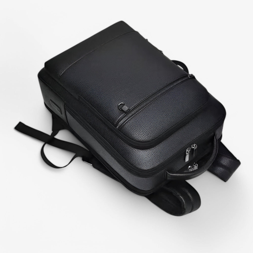 Ryggsäck i konstläder med inbyggd USB-laddningsport