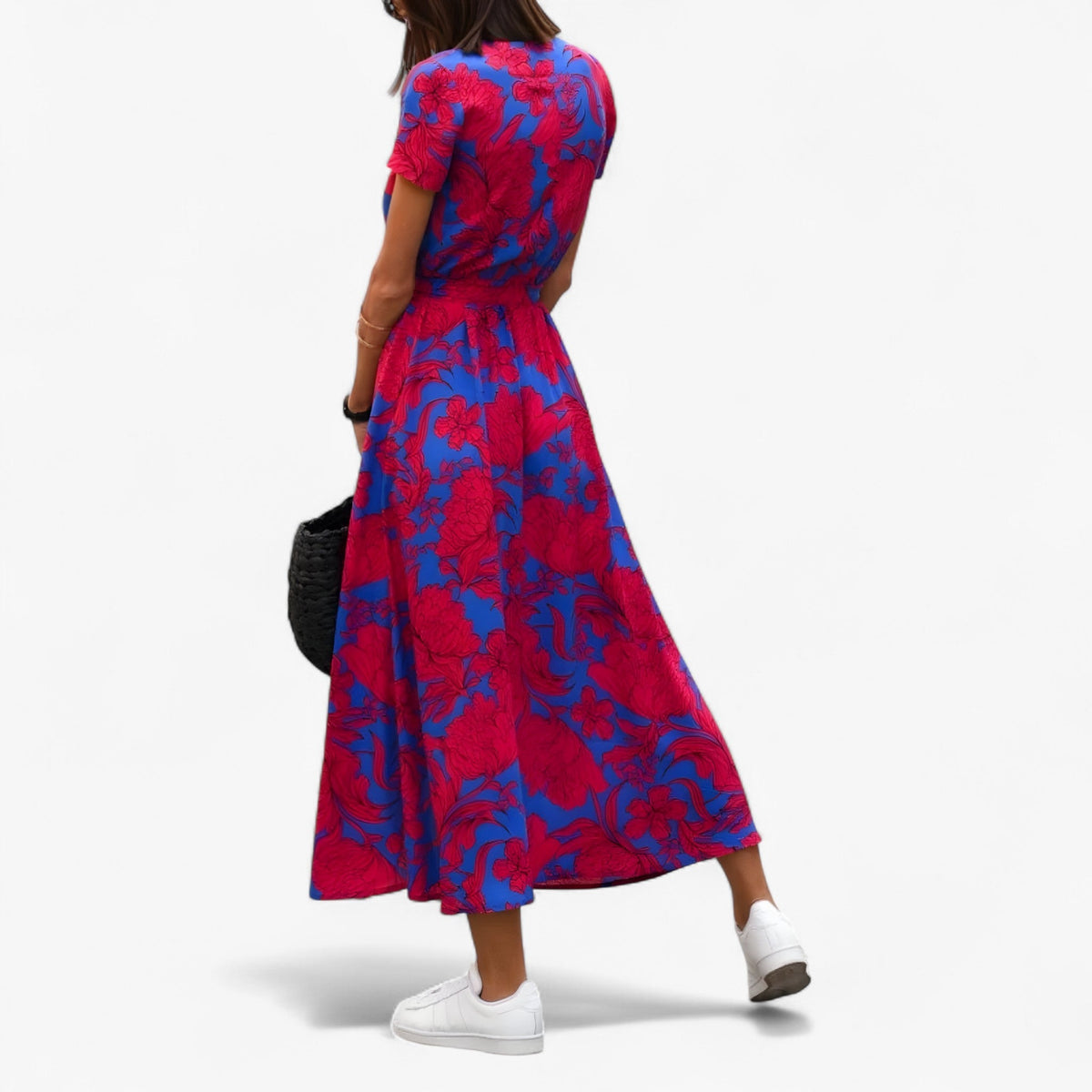 Vestido con cuello de pico, cintura entallada y falda fluida