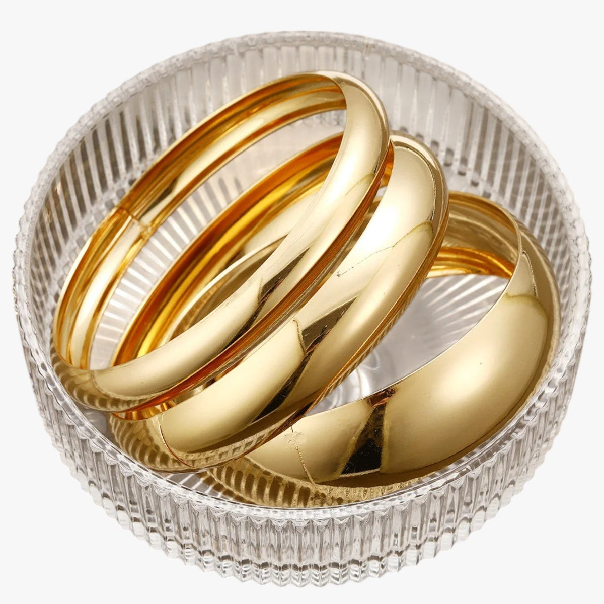 Conjunto de pulseras doradas apilables con carácter para la noche