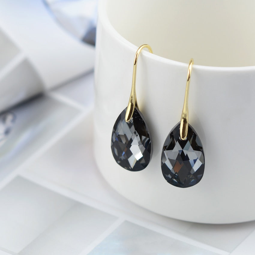 Elegant Teardrop Earrings with Blue Crystal Detail