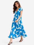 Vestido largo con cuello de pico, estampado artístico y mangas fluidas