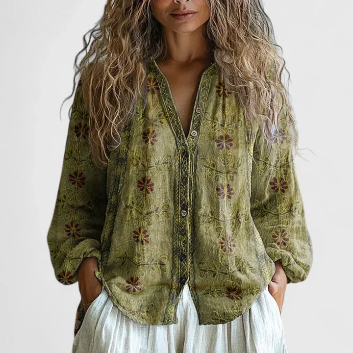 Blusa con estampado retro de hojas y corte moderno