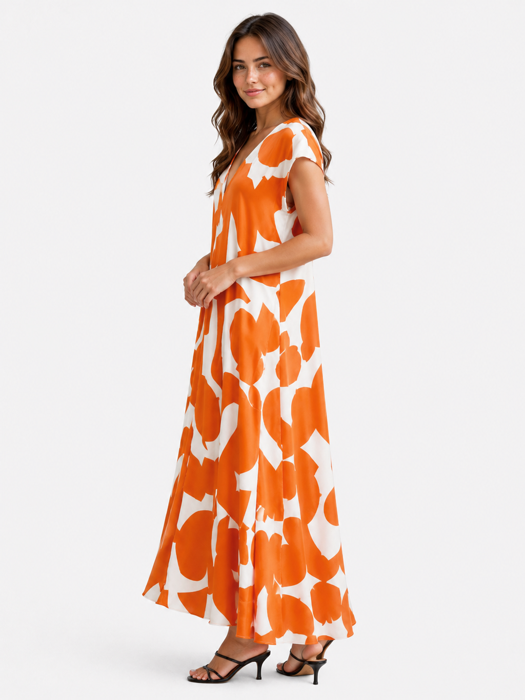 Vestido largo con cuello de pico, estampado artístico y mangas fluidas