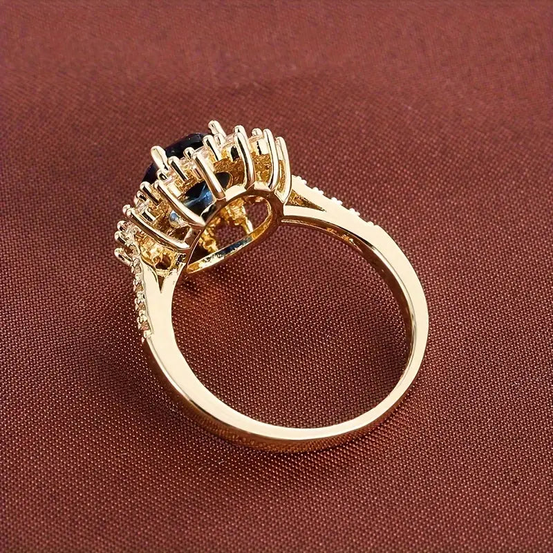 Blue Stone Cocktail Ring with Crystal Halo Setting