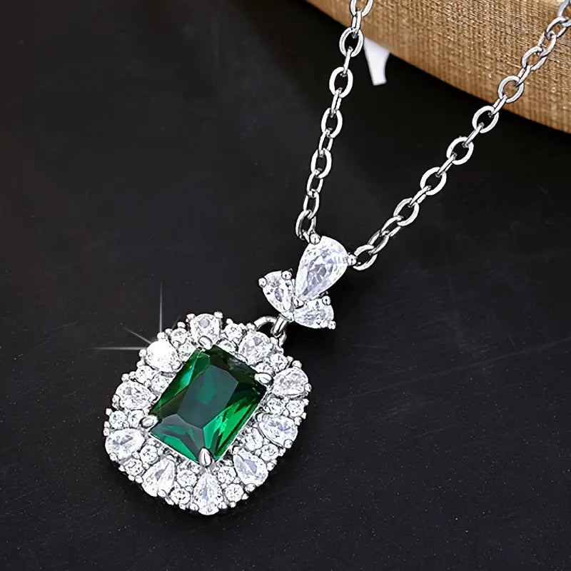 Green Cushion Stone Halo Pendant with Bow Bail and Vintage Charm