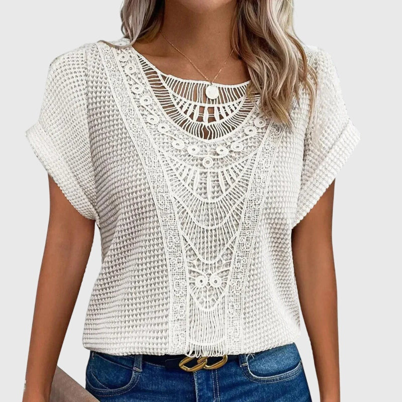 Blusa con detalle de encaje y corte holgado de verano