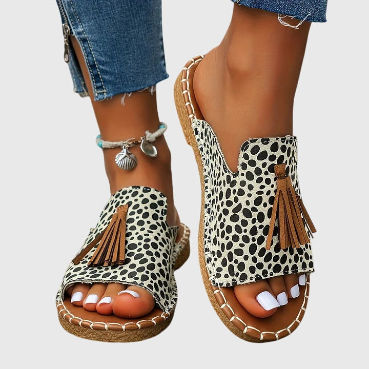 Dämpad sandal med ovandel som andas