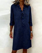 Vestido de algodón y lino con cuello de pico y detalle de volantes