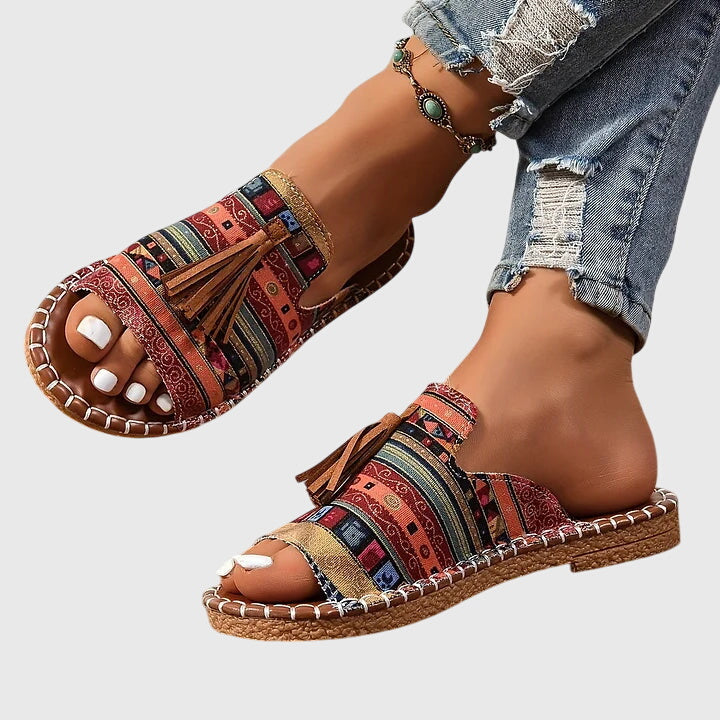 Dämpad sandal med ovandel som andas