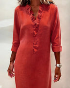 Vestido de algodón y lino con cuello de pico y detalle de volantes