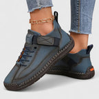 Sneakers med bred tåbox, skumsula och resårpaneler