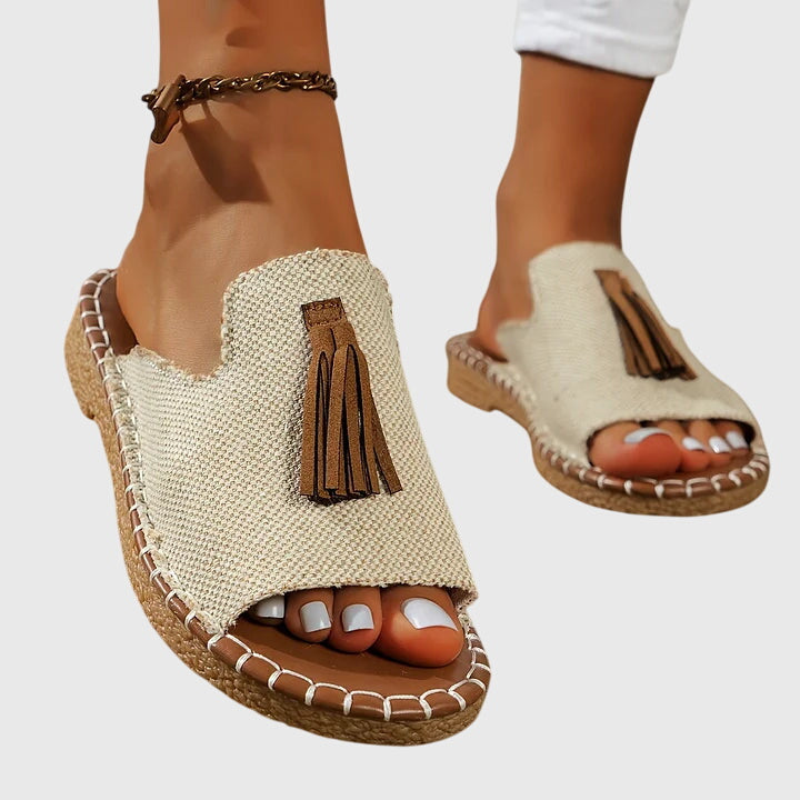 Dämpad sandal med ovandel som andas