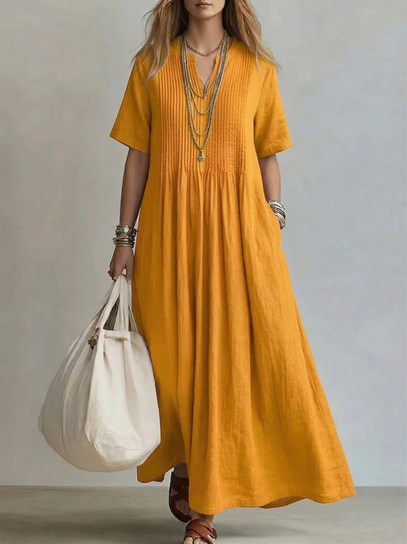 Pleated Cotton Dress with a Flowing Silhouette
