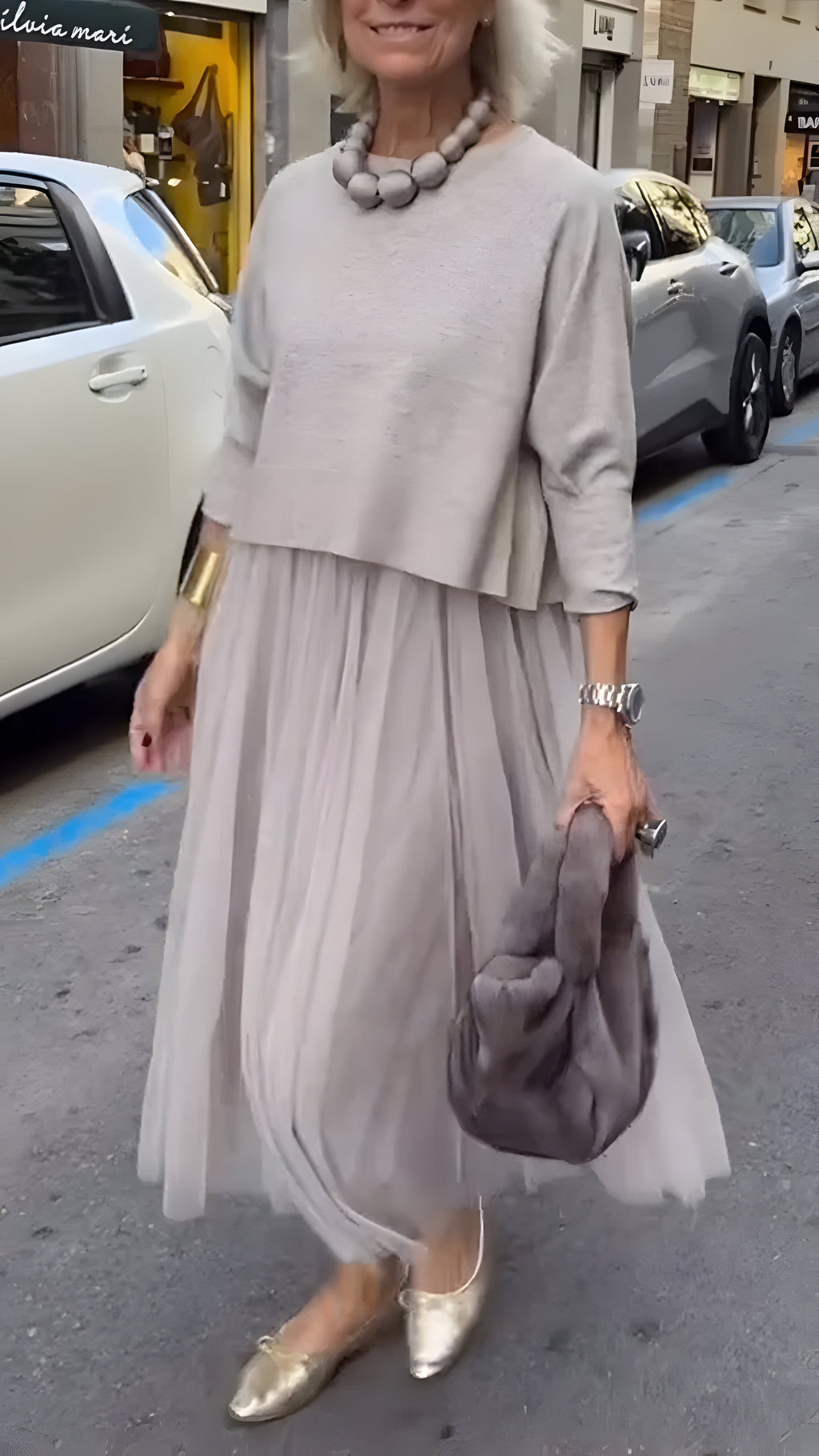 Vestido midi por capas con una silueta refinada para el día a día
