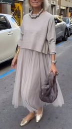 Vestido midi por capas con una silueta refinada para el día a día