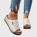 Sandaler i öppen design med svalkande känsla i tyg som andas