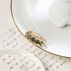 Olive Green Cubic Zirconia Ring with Vintage-Style Setting