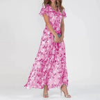Vestido largo fluido con efecto cruzado, estampado sutil y cuello de pico