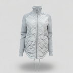 Chaqueta acolchada ligera con detalle de retales y cintura ajustable