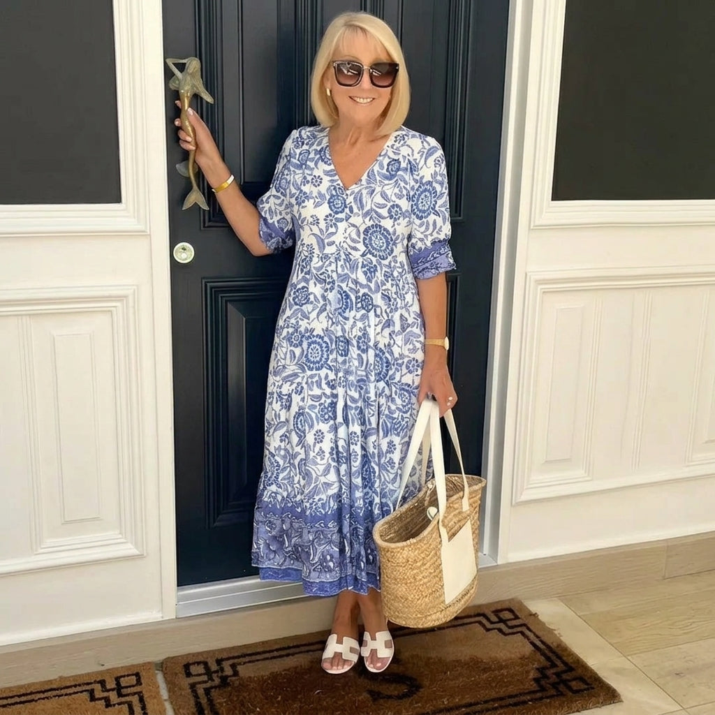Vestido floral con cuello de pico y cintura imperio fruncida