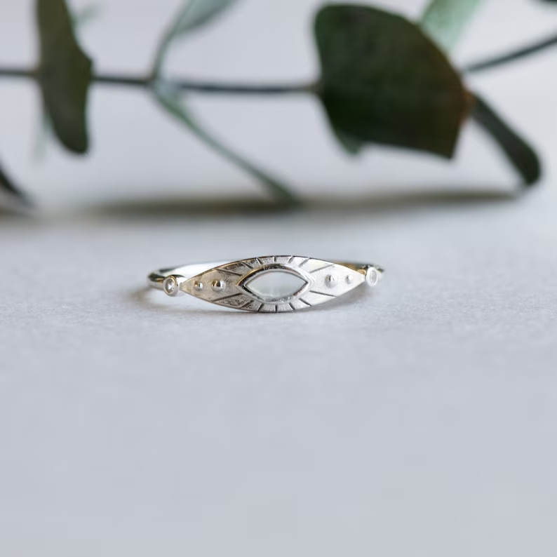 Vintage-Style White Stone Ring with Timeless Setting