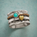 Two-Tone Spinner Ring with Blue-Green Stone and Heart