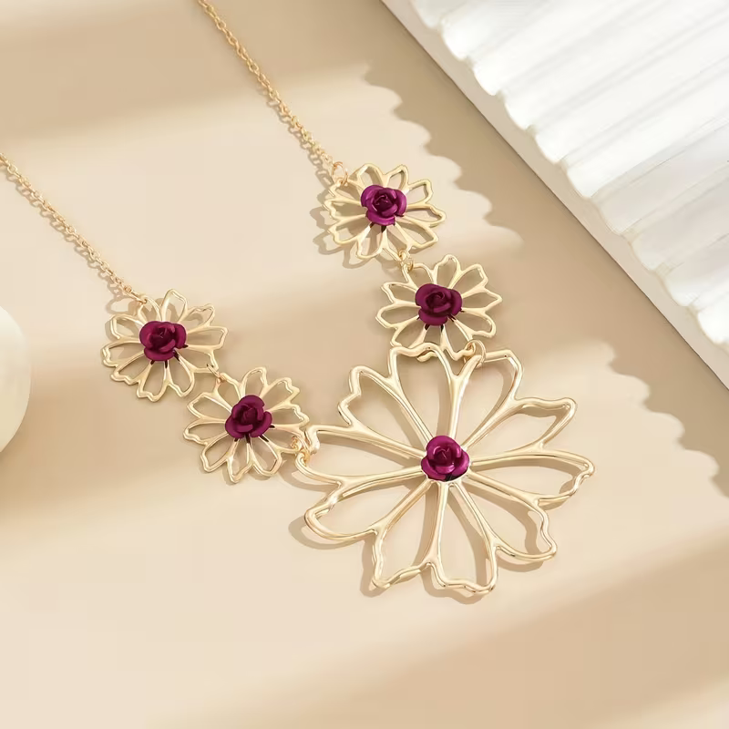 Red Stone Petal Necklace with Floral Arrangement and Rich Sparkle
