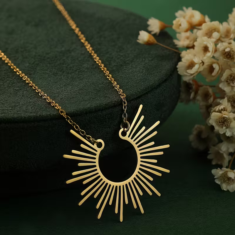 Sunburst Pendant Necklace with Radiating Design and Warm Energy