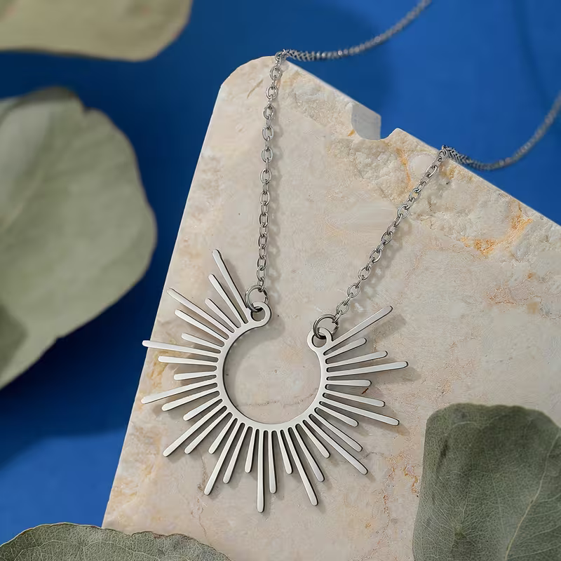 Sunburst Pendant Necklace with Radiating Design and Warm Energy