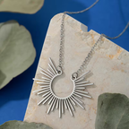 Sunburst Pendant Necklace with Radiating Design and Warm Energy