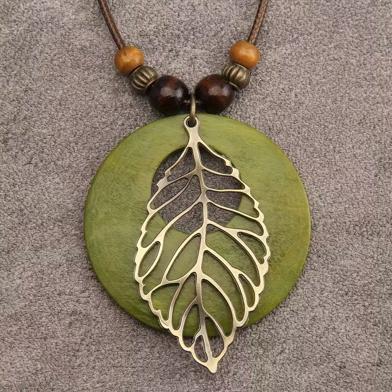 Green Disc and Filigree Leaf Pendant Necklace with Botanical Detail