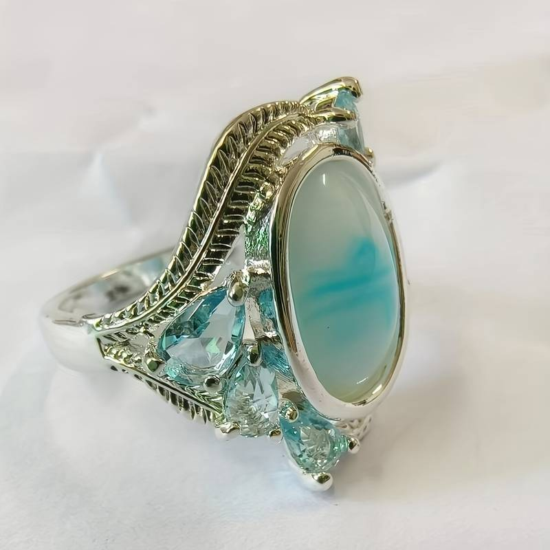 Vintage-Style Iridescent Blue-Green Stone Ring with Soft Shimmer
