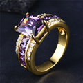Violet Glass Ring with Channel-Set Side Stones in Gold Colour