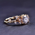 White Crystalline Ring with Light-Catching Setting in Gold Colour