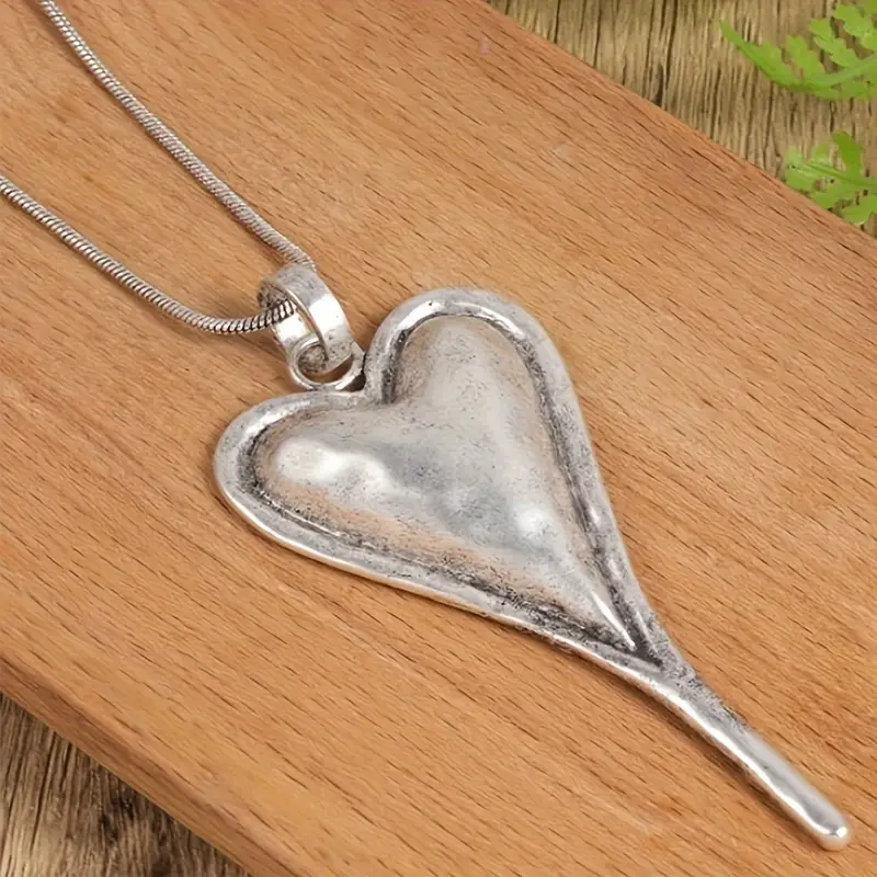 Heart Drop Pendant Necklace in Silver Colour with Romantic Feel