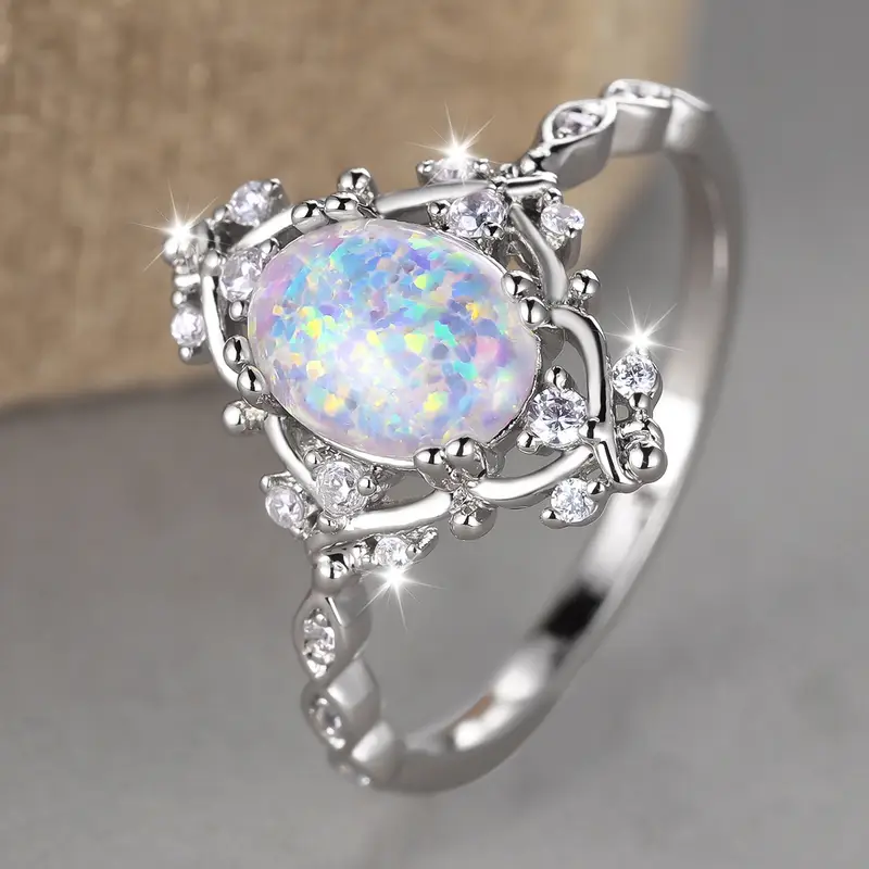Iridescent White Stone Ring with Bright Setting and Colour Play